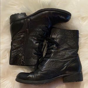 Black combat boots by Franco Sarto